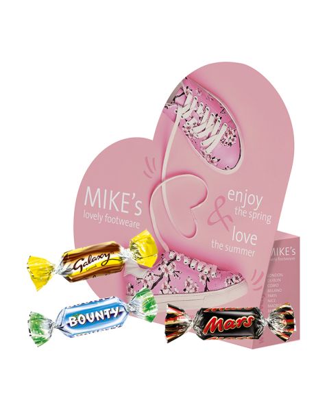 Celebrations Mix in heart-shaped box with advertising print