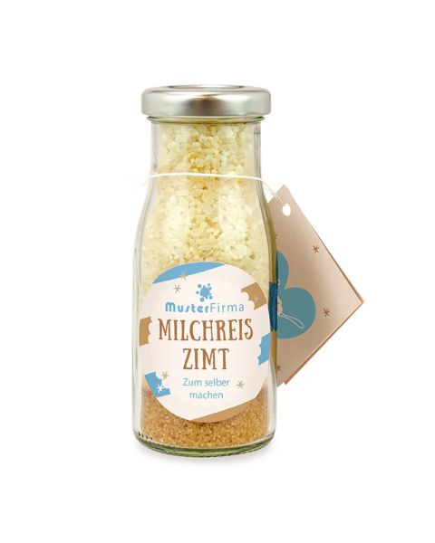 Do-it-yourself bottle of cinnamon rice pudding with promotional label and tag
