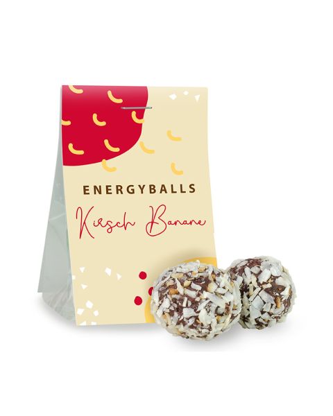 Snack bag of cherry and banana energy balls with advertising tab