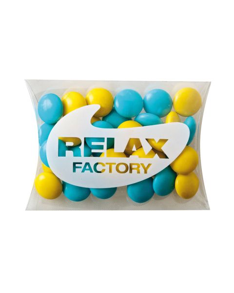 15 g coloured chocolate lentils in mini cushion with promotional label