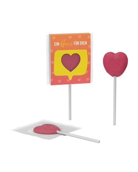 Lolly in Herzform in einer Kartonhülle mit Herzausstanzung und Werbedruck
