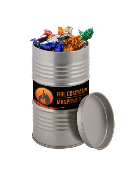 Oil barrel filled with metallic sweets and advertising label