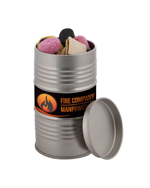 Oil drum filled with English liquorice and advertising label