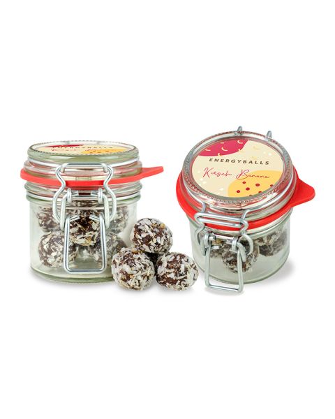 Cherry banana energy balls in XS clip-top jar with promotional label