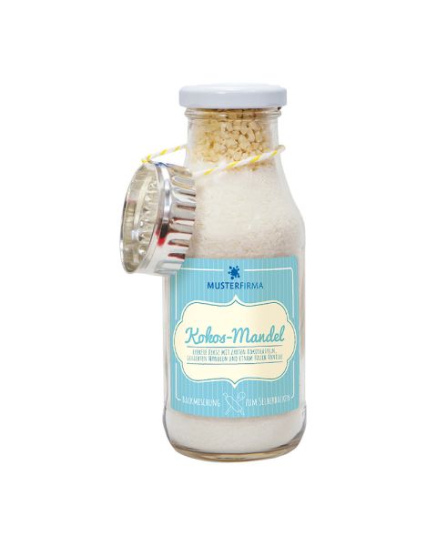 175 g coconut and almond cookie mix in a bottle with cookie cutter and promotional label