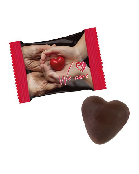 Filled gingerbread heart in promotional bag