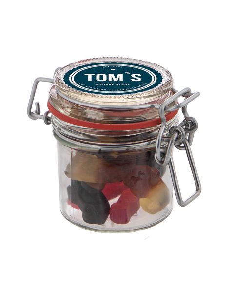 0.13 litre Weck jar filled with liquorice in the shape of a car and with promotional label