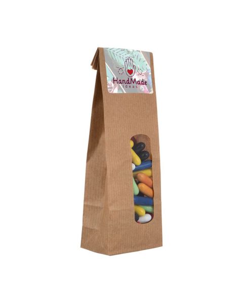 Liquorice sticks in kraft paper bag with promotional label