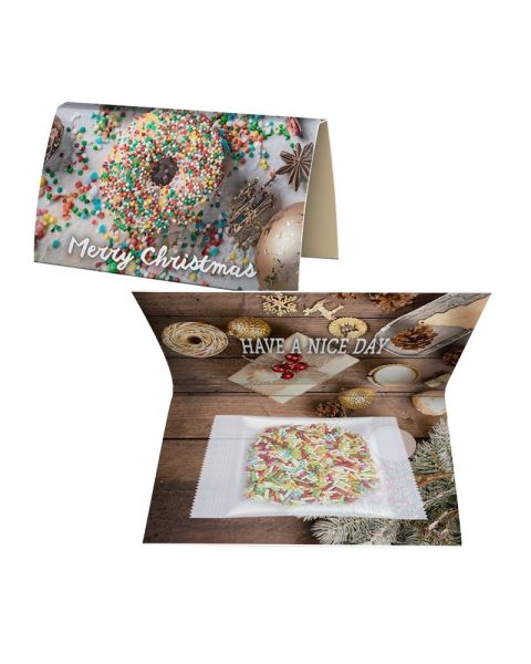 Organic sugar sprinkles in folded advertising card with advertising print