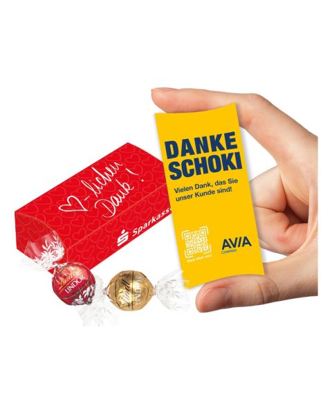 2 Lindor Pralinés in einer individuell bedruckten Werbekartonage