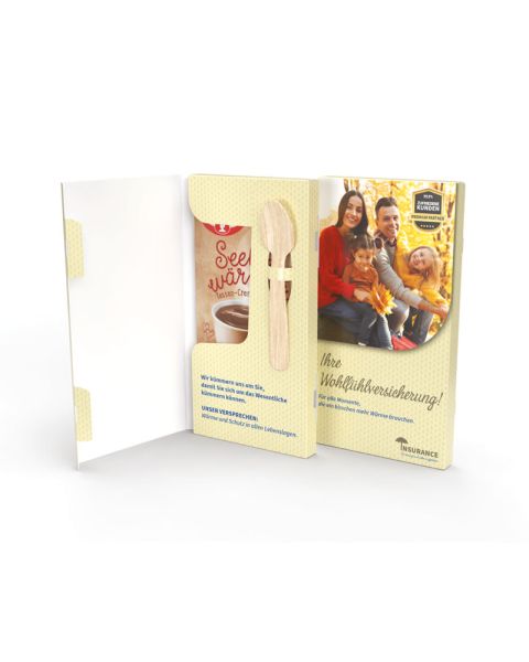 Dr. Oetker chocolate cup pudding in a folding cardboard box with spoon and advertising print