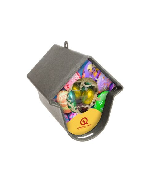 Evie bird feeder from Singing Friend with chocolate Easter eggs and promotional print