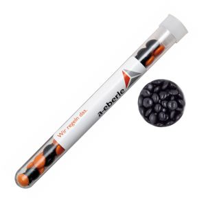 16 g schwarze Schoko-Linsen im Reagenzglas mit Werbeetikett