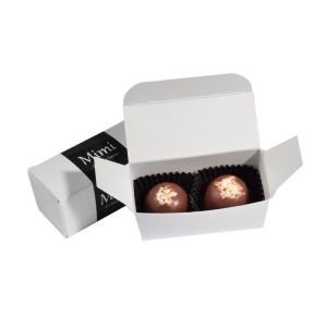 2 Nuss-Nougat-Pralinen in Kartonage mit Banderole