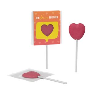 Lolly in Herzform in einer Kartonhülle mit Herzausstanzung und Werbedruck