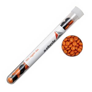16 g orangene Schoko-Linsen im Reagenzglas mit Werbeetikett