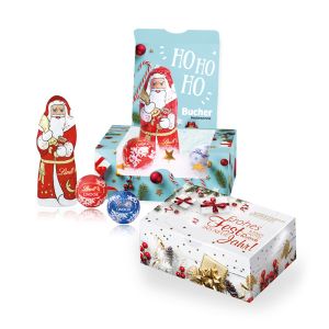 Lindt Weihnachtsmann im Schnee in Werbekartonage mit Bedruckung