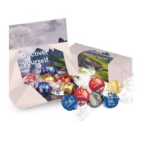 Lindt Lindor Pralinés in individueller Geschenkverpackung (Graspapier) mit Werbebanderole