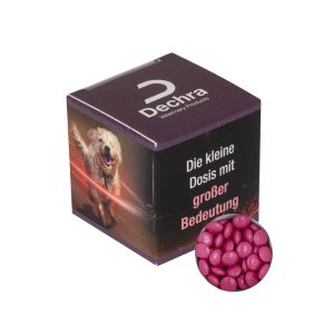 Werbewürfel mit pinken Schoko-Linsen und Werbedruck