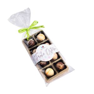 8 Fruchtpralinen im Klarsichtbeutel mit grüner Schleife und Banderole