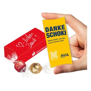 2 Lindor Pralinés in einer individuell bedruckten Werbekartonage