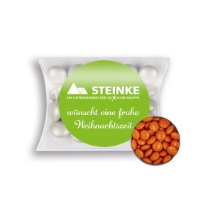 15 g orangene Schoko-Linsen in Mini-Kissen mit Werbeetikett