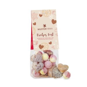 80 g Bonbons mit Lebkuchen- und Winterpunschgeschmack im transparenten Standbeutel mit beidseitig bedruckbarem Werbereiter
