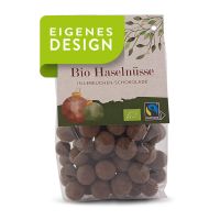 160 g LANDGARTEN Bio Haselnüsse in Lebkuchenschoko im Standbodenbeutel und Werbereiter Bild 1